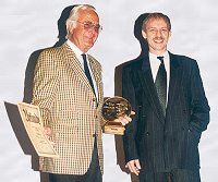 Giving the award to Martin Böttcher (left), on the right: CD-producer Arild Rafalzik.